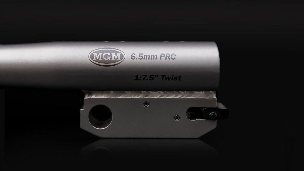 A detailed view of a 6.5 PRC rifle barrel, showcasing its construction and design features that contribute to its durability and performance.