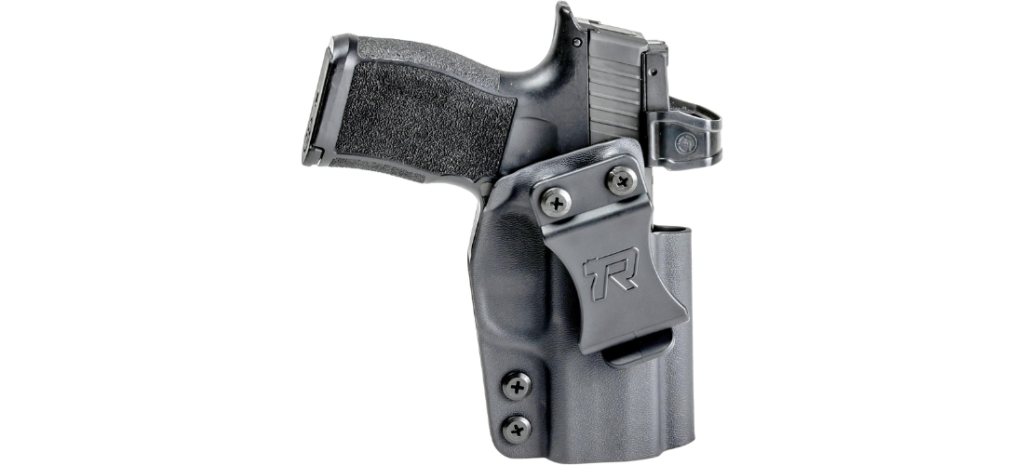 Black handgun secured in a molded IWB Kydex holster with adjustable belt clip on a white background.