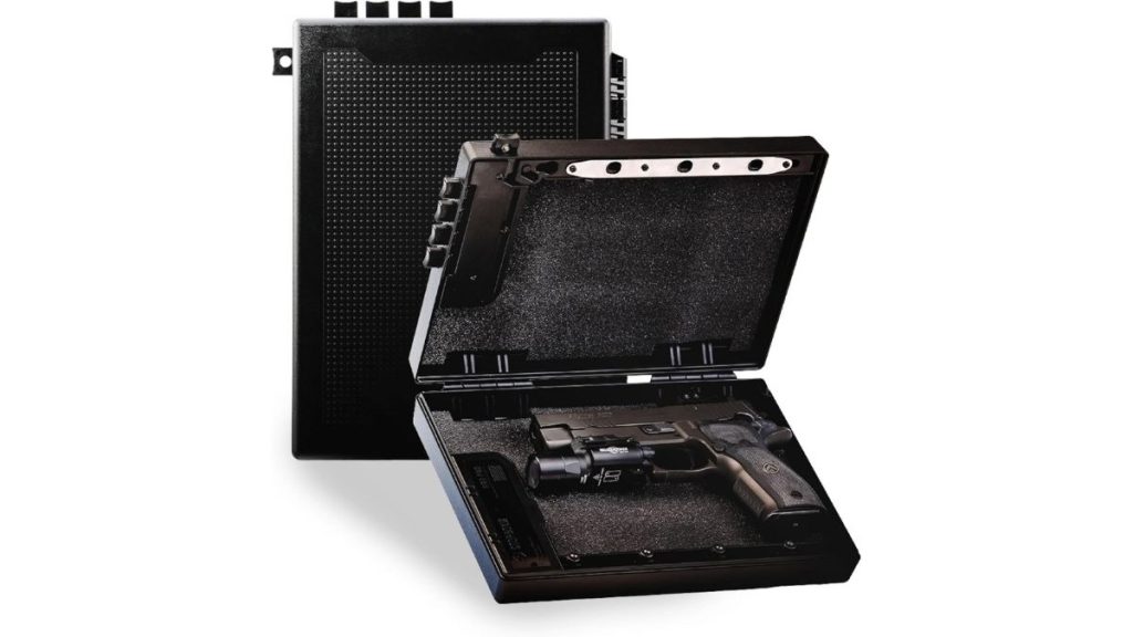 Open black quick-access handgun safe with foam interior and pistol inside.